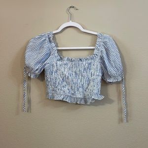 Shop Neighbor blue and white striped smocked crop top. Size medium.